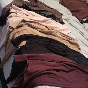 Assorted Women's Long Sleeve Bodysuits in Neutral Tones